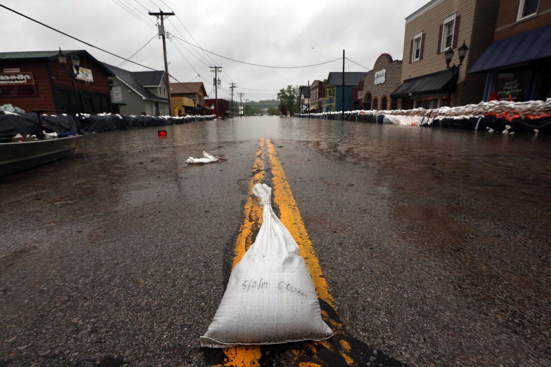 Sandbag levee in Eureka is holding back floodwaters